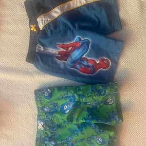 Two pairs boys swim trunks